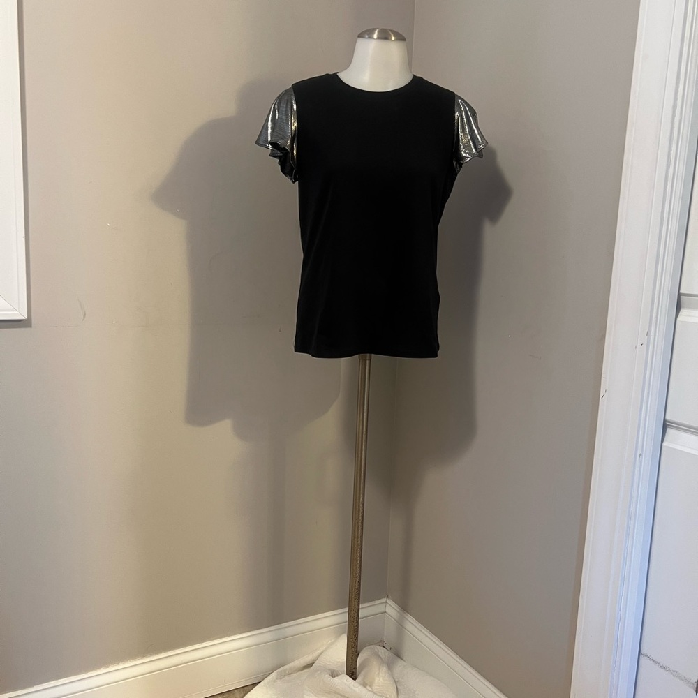 Chic Black Top with Silver Sleeves